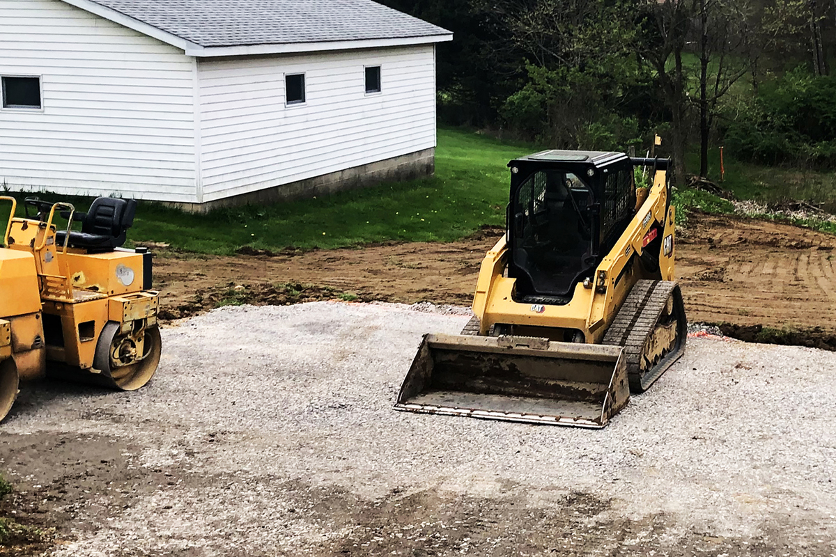 Excavator working a site preparation job